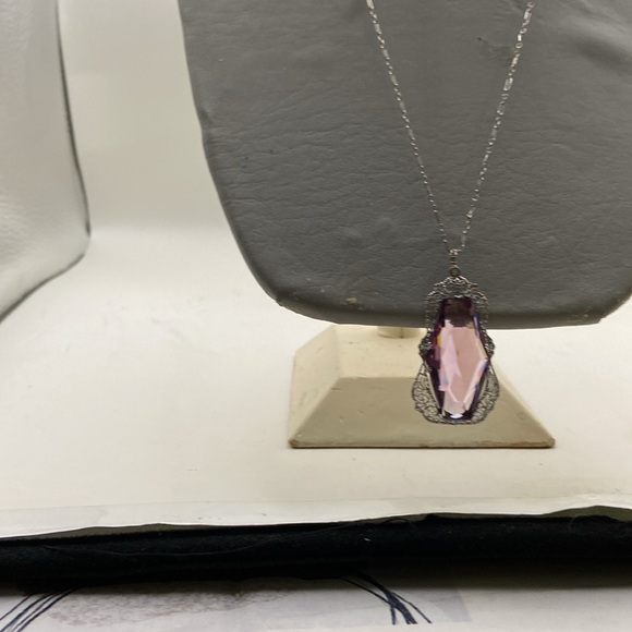 this is a is an antique costume piece being sold as its value as an antique. - Picture 5 of 7